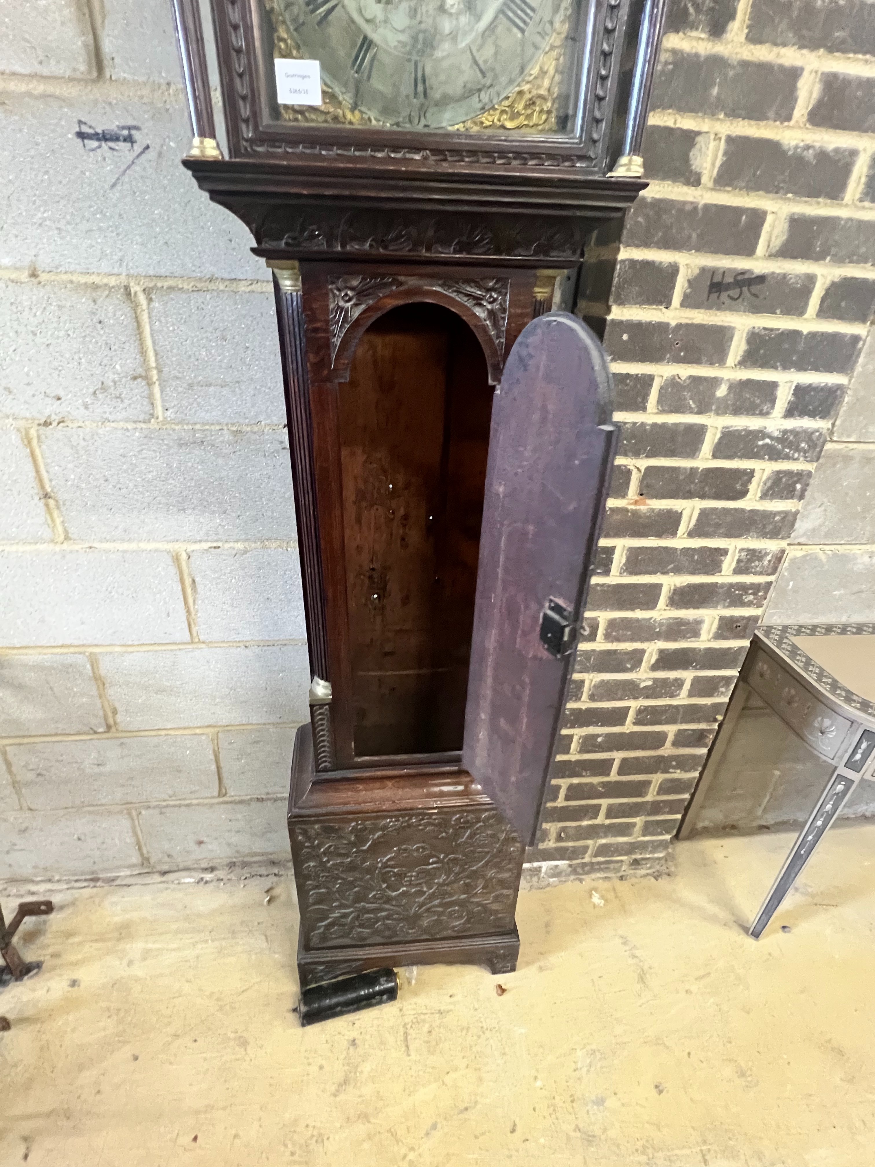 Barrett of Stowmarket. A George III carved oak eight day longcase clock, height 220cm